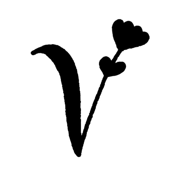 
White hand-drawn letter “V” with a small heart-shaped flower sprouting from the right side, shown on a dark background.